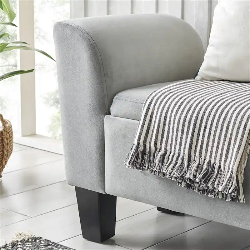 Banc ottoman en velours avec rangement et accoudoirs incurvés